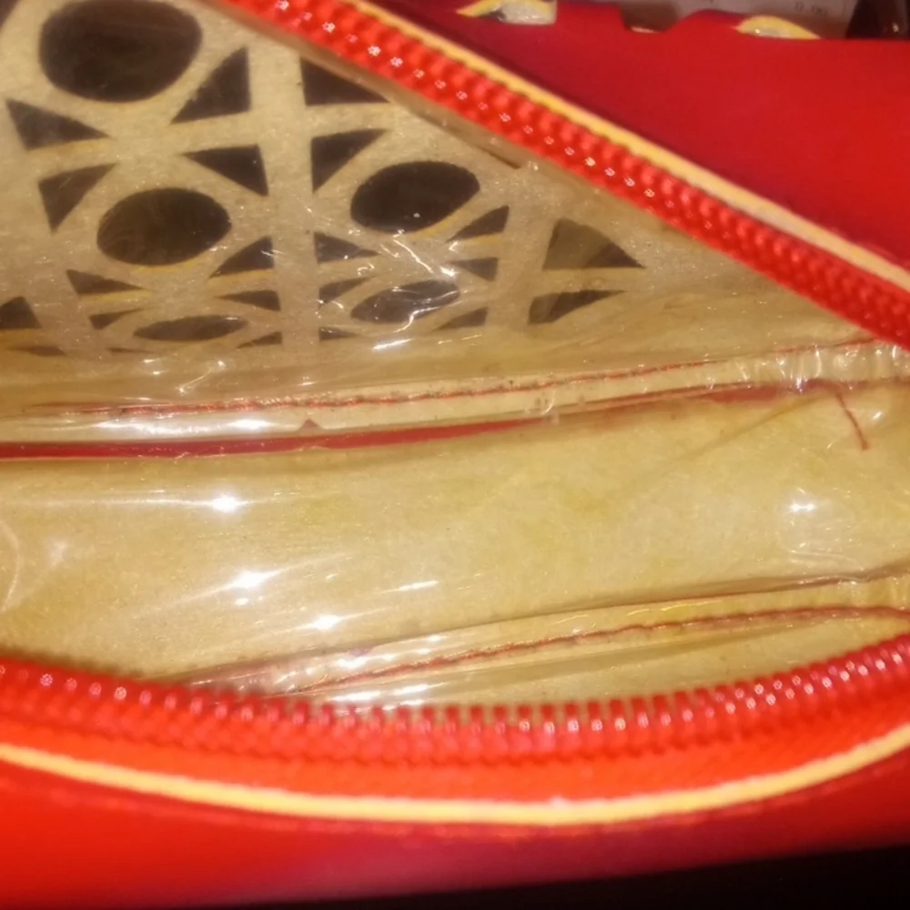 Kaisite Lazer Cut Wristlet GUC